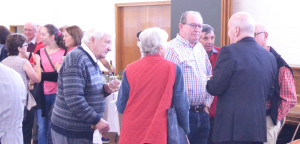 Reception at school hall after Church blessing, Nov 29, 2015. Catching up with Bishop Terry Click to enlarge pic.